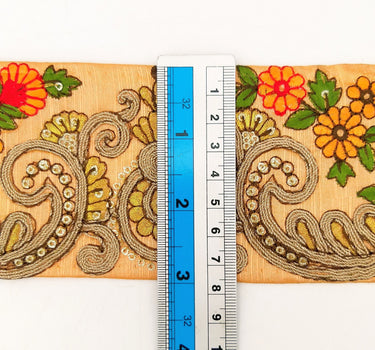 Peach Art Silk Fabric Trim With Orange, Green, Red And Gold Floral Embroidery